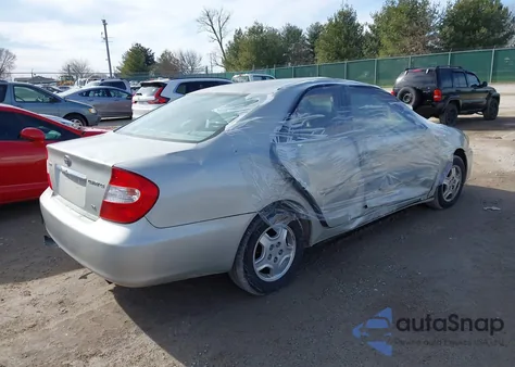 2002 Toyota Camry Le V6 z USA, uszkodzony, nr VIN 4T1BF30K32U020745